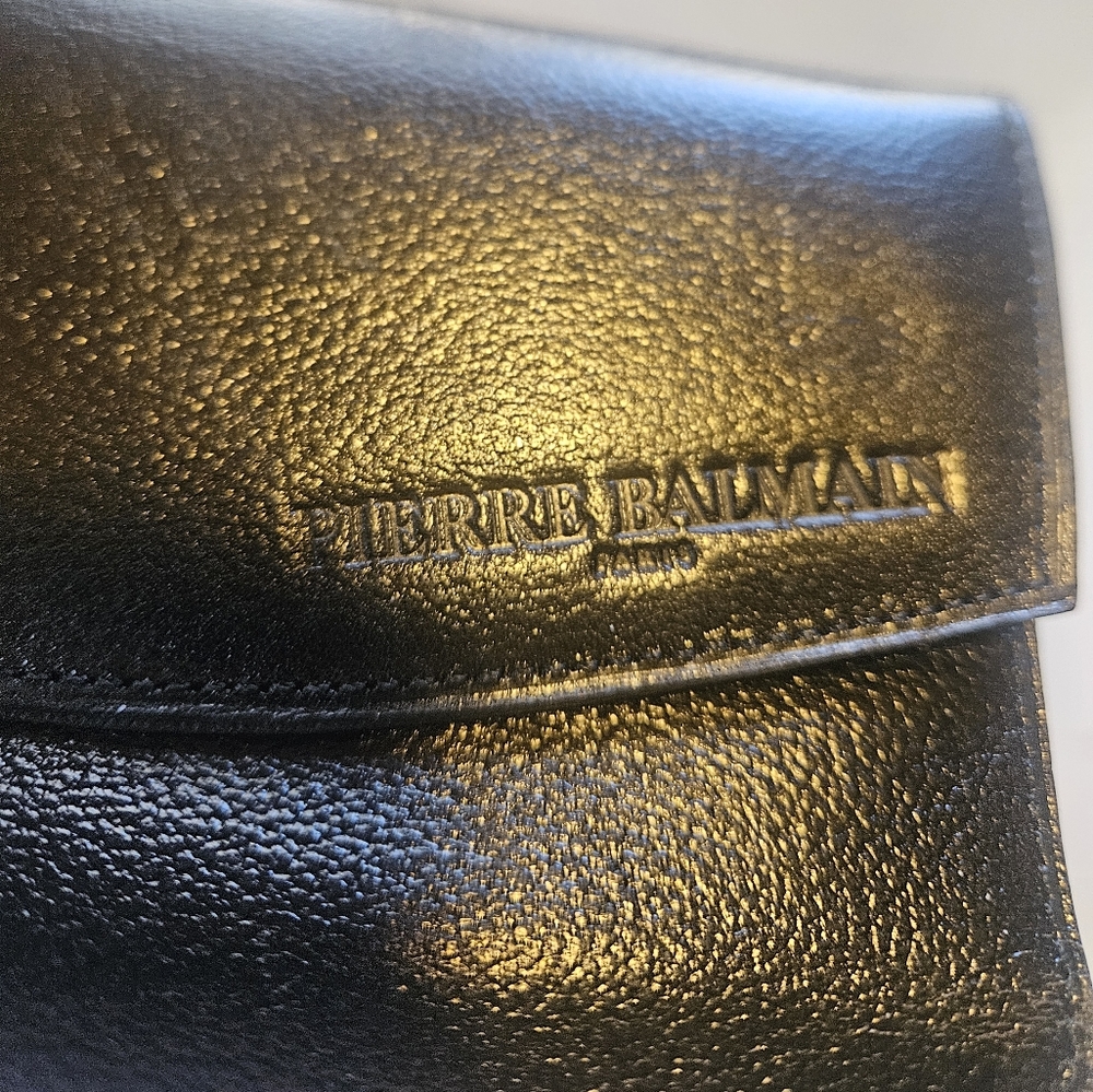 NEVER USED PIERRE BALMAIN DARK BROWN LEATHER WALLET. Several pockets.